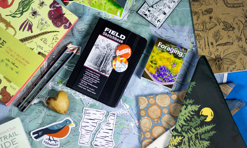 Get ready to be out in nature with a new bandanna, sketchbook, field guide, map, compass and magnifying glass.