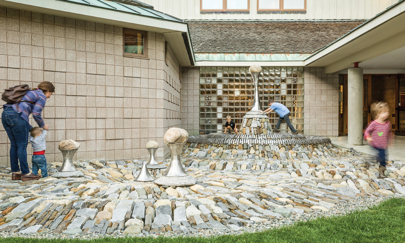 people walking outside on rock area outside of montshire