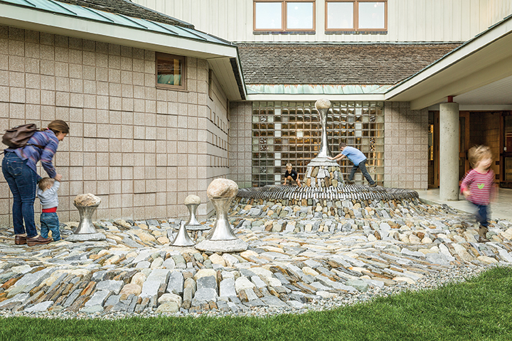people walking outside on rock area outside of Montshire