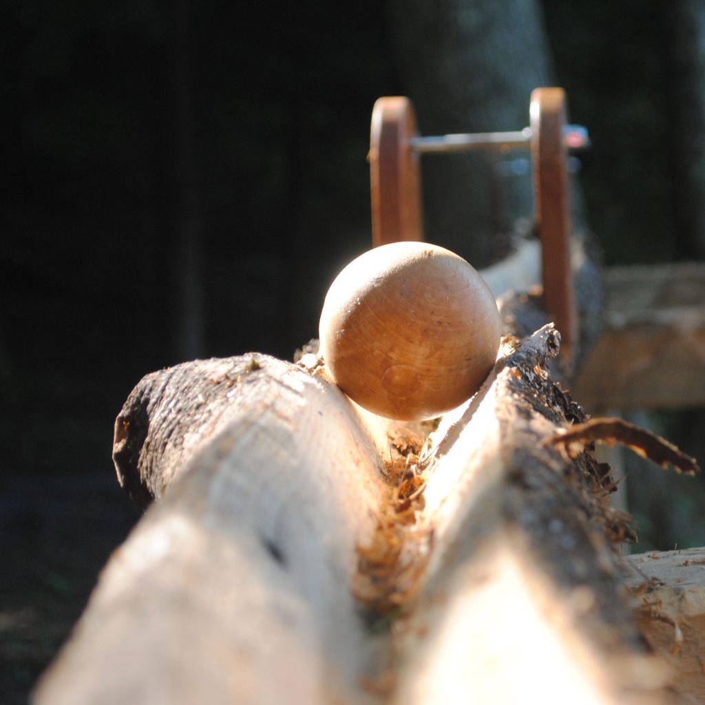 A wooden ball on a Timber Tumble raceway