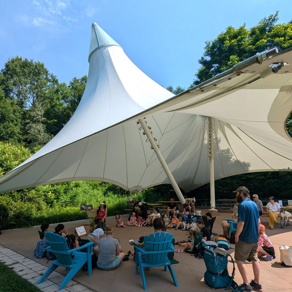 Science story time held outside in the Montshire Pavilion